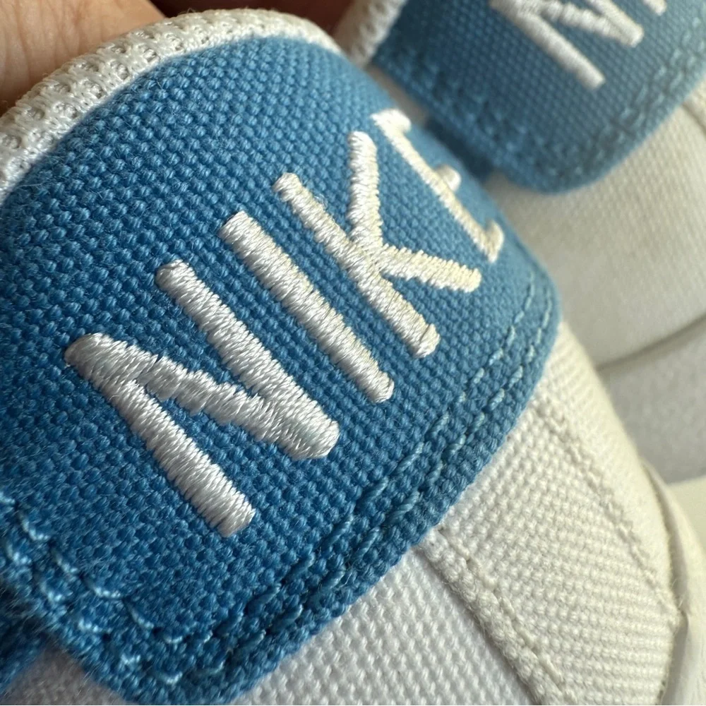 Nike Blazer Classic Low 77 in white canvas with a blue swoosh sz 7.5
